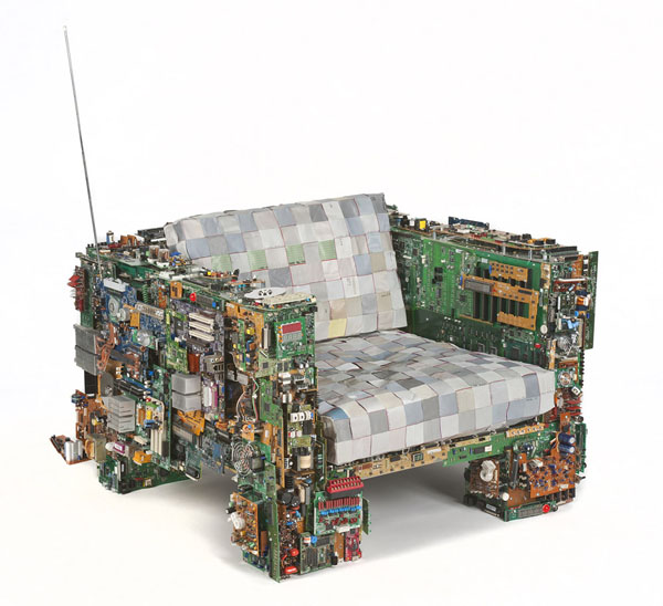 Benjamin Rollin Caldwell's "The Binary Chair" was one of the show stoppers at this year's Design Miami art fair. Made completely of computer parts (no underlying frame), including the cushions (though they are stuffed with foam), the work is an impressive work of contemporary design. (image via chairblog.eu)