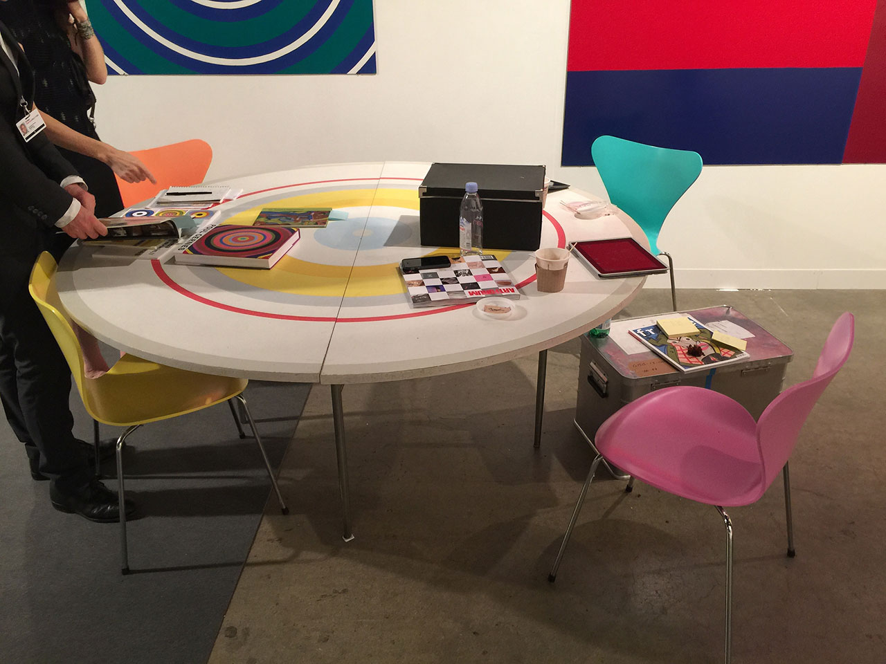 Copenhagen's Galleri Bo Bjerggaard was one of the rare spaces that brought in a table and chairs designed by the artist. The table was created and used by artist Poul Gernes as a dining table when he was still alive, while the Arne Jacobsen chairs were painted these colors at the request of the artist (the company asked him to select the colors for the Danish Pavilion at the 1988 Venice Biennale. (all photos by the author for Hyperallergic)