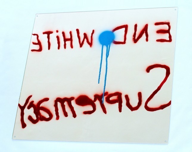 Sam Durant, "End White Supremacy" (2009), spray enamel on mirror 29 x 31 in (73.66 x 78.74 cm), Courtesy of the artist and an anonymous donor (via Paddle8)