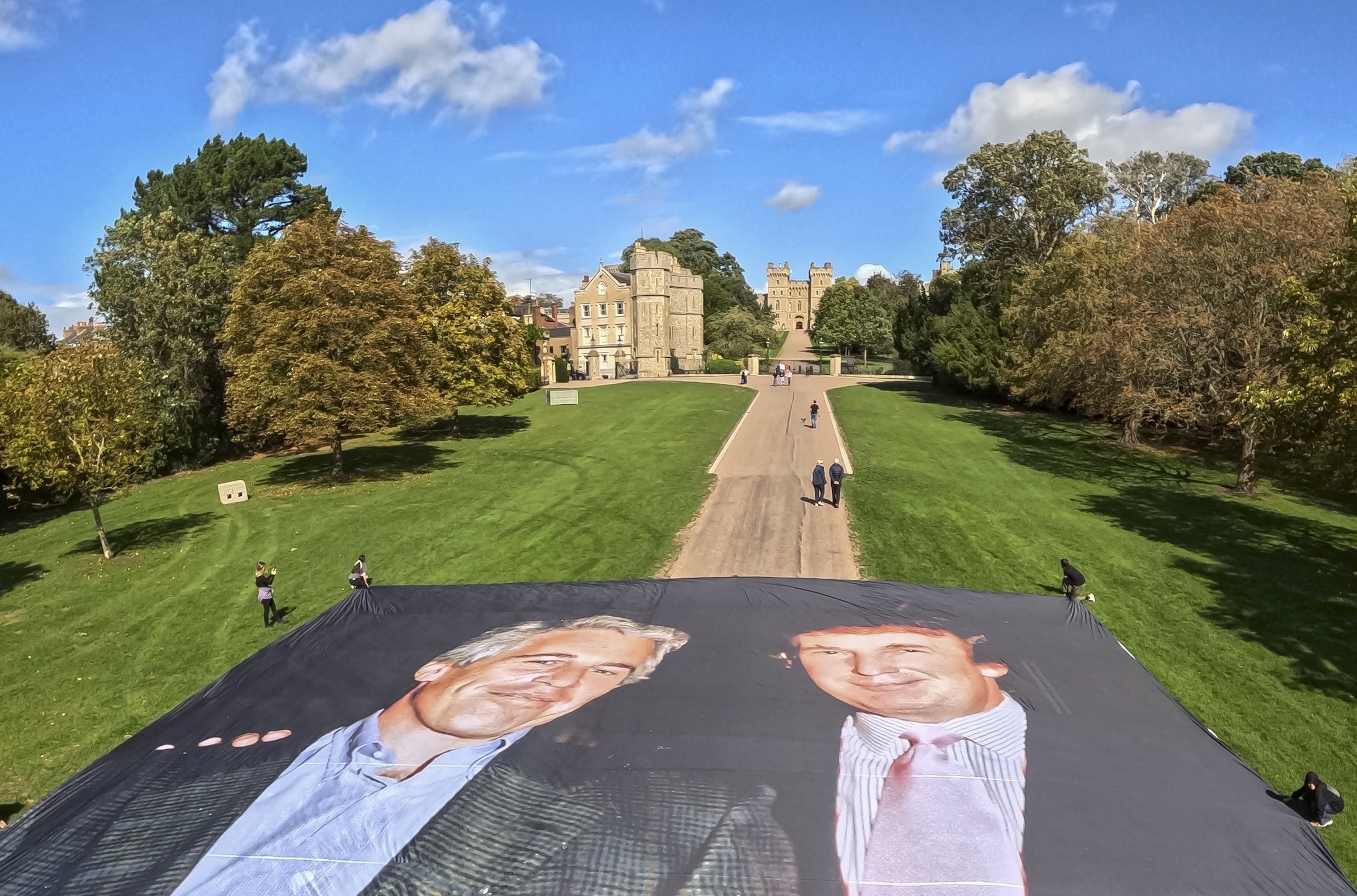 Massive Photo of Trump and Epstein Unfurled Outside Windsor Castle